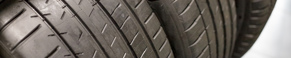 Learn Maintenance Warning Signs at West Broad Kia in Henrico, VA | Close up of used tires next to each other 