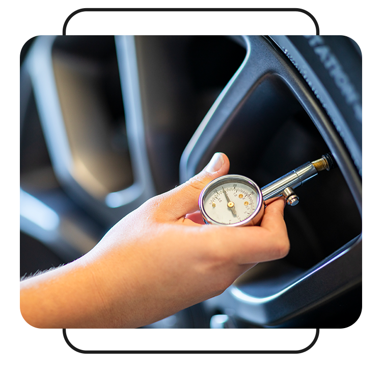 Tire Pressure Information at West Broad Kia in Henrico, VA | close up of tire pressure gauge on tire pressure valve 