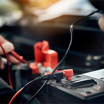Battery Information at West Broad Kia | Close-up of wires going into battery