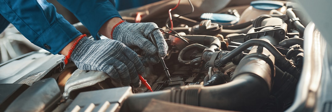 Battery Information at West Broad Kia | Conducting voltage test for car battery