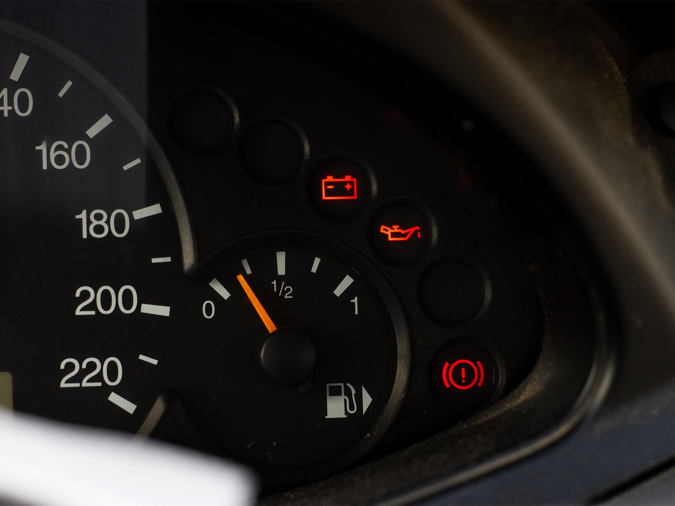 Understanding Your Kia’s Emergency Lights at West Broad Kia in Henrico, VA | Car dashbaord with red emergency lights on