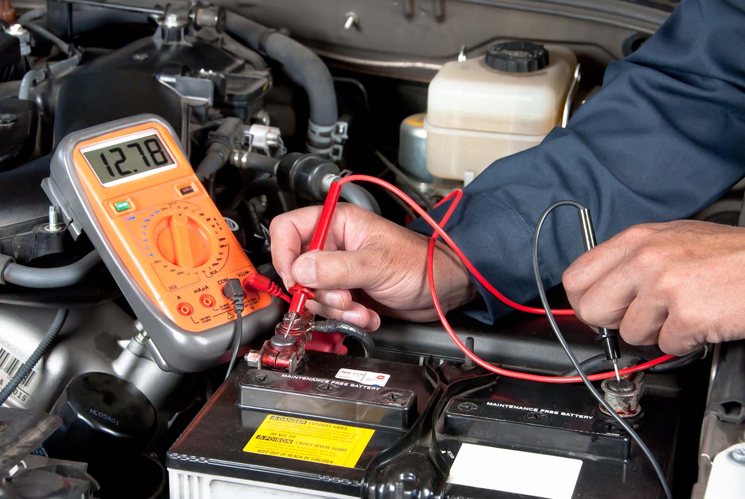 Everything You Need to Know about Your Car Battery at West Broad Kia | Kia service technician testing battery health in a vehicle