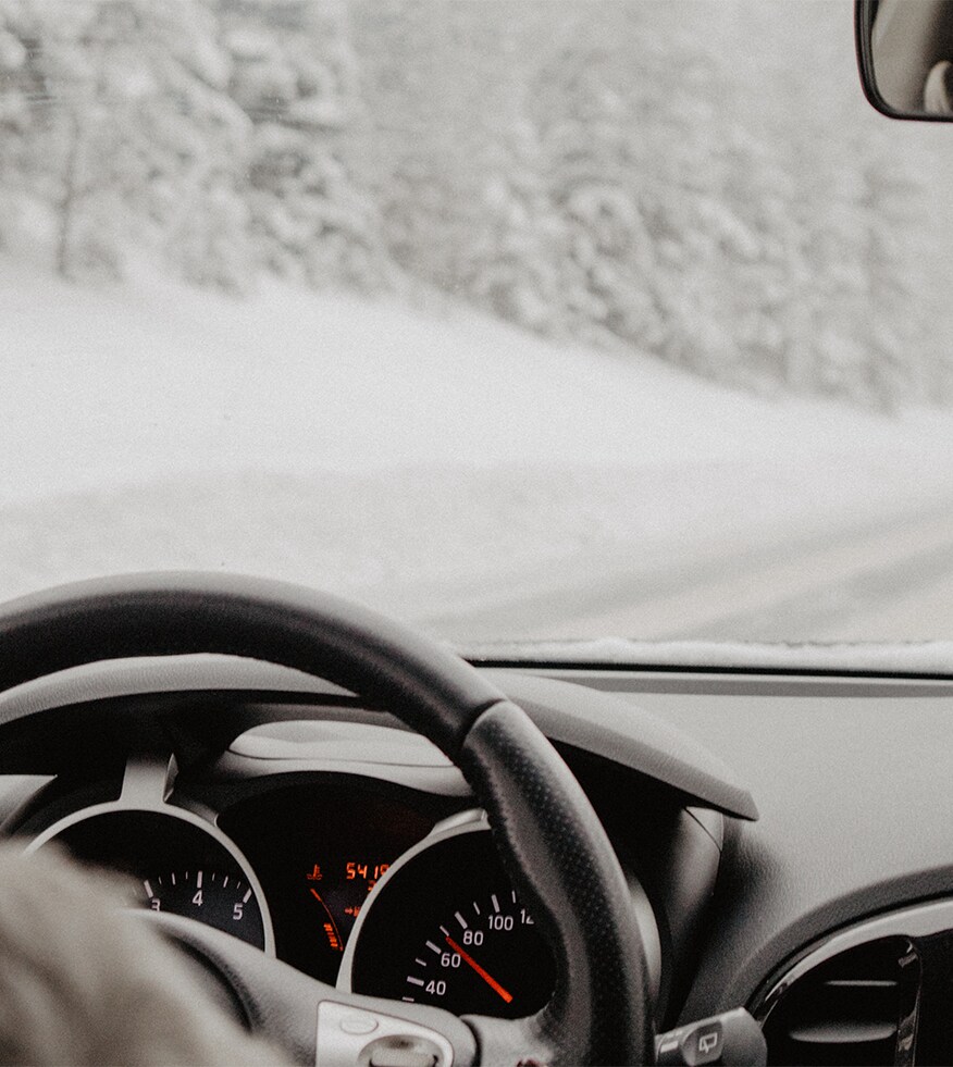 How to Prevent your Vehicle from Fogging Up At  West Broad Kia in Henrico, VA | View of a person driving their car in the middle of the snow with some fog on the windshield 