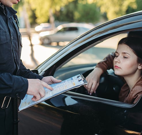 Why You Shouldn’t Drive Around with a Chipped Windshield at West Broad Kia in Richmond, VA | Police giving driver a ticket