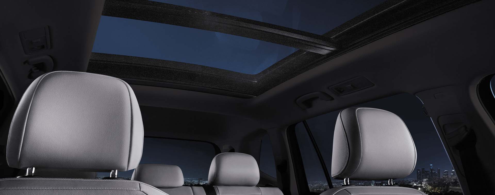 Compare the 2021 Volkswagen Tiguan vs. the 2021 Honda CR-V at West Broad Volkswagen | Interior of the 2021 Volkwagen Tiguan at Night - Showing off Ample Cabin Head Room & Sunroof
