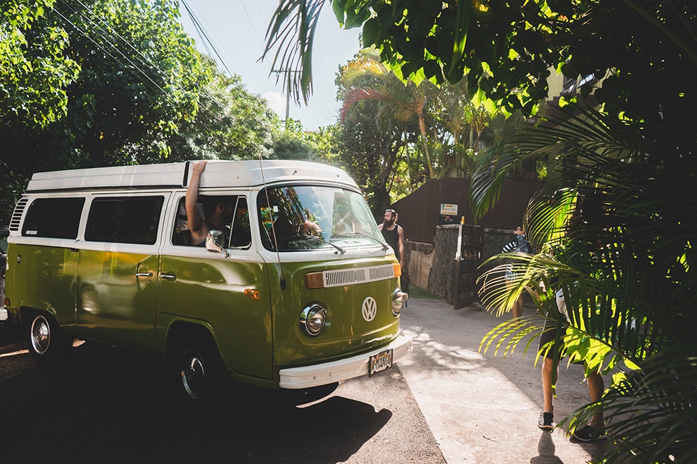 The Volkswagen ID.Buzz is Coming to West Broad Volkswagen in Richmond, VA | An old Volkswagen Bus parked in a tropical area