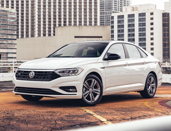 Basic Car Maintenance and Servicing Checklist | West Broad Volkswagen | A Photograph of a 2021 Volkswagen Jetta Sitting on a City Rooftop