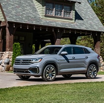 Model Features of the 2021 Volkswagen Atlas Cross Sport at West Broad VW | Atlas Cross Sport parked at home