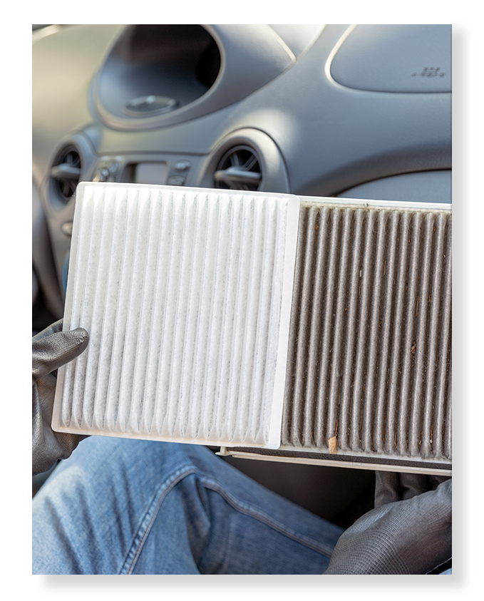 Everything You Need to Know About Cabin Air Filters | West Broad VW | Person holding a new cabin air filter and a used cabin air filter next to each other 