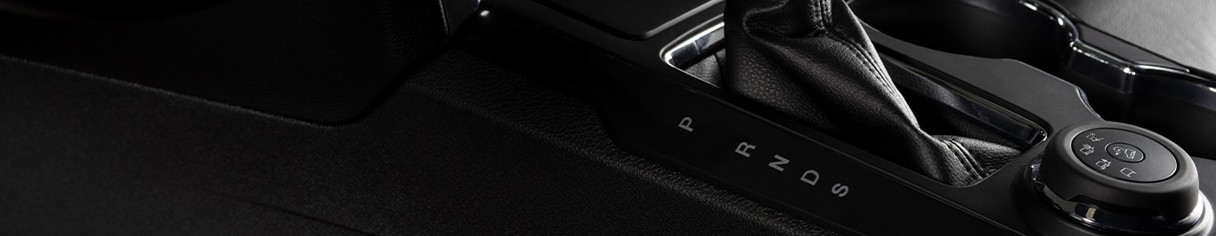 Enjoy A Test Drive At   West Broad VW in Richmond, VA | Close up of black interior of a new car showing the center console 