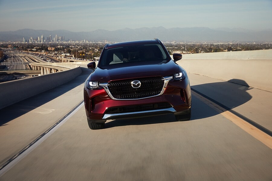 Mazda vehicle driving on a highway
