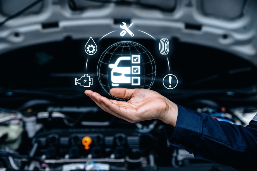 Hand holding a car features checklist graphic
