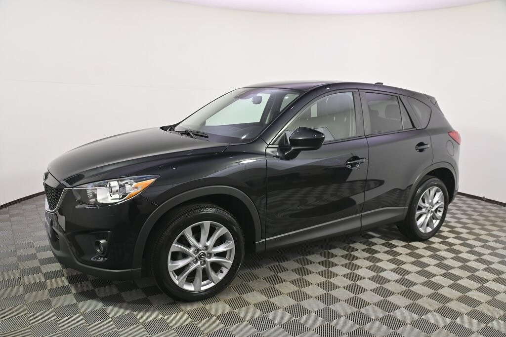 Used 2014 Mazda CX-5 Grand Touring with VIN JM3KE4DY4E0393016 for sale in Saint Louis Park, Minnesota