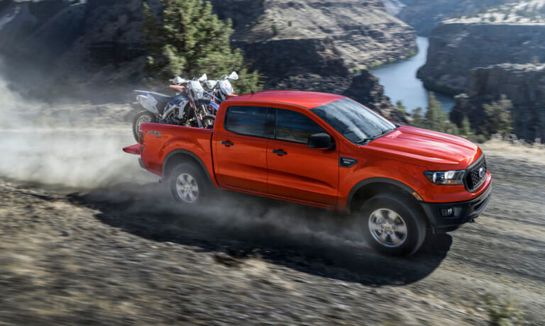 2022 Ford Ranger driving offroad with mountain bikes