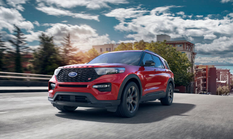 2021 Ford Explorer in red exterior by buildings