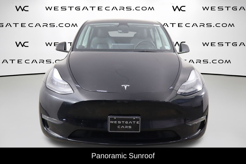 Used 2023 Tesla Model Y Long Range with VIN 7SAYGAEE8PF633563 for sale in Raleigh, NC
