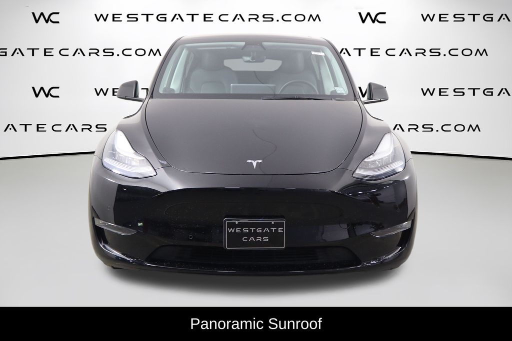 Used 2021 Tesla Model Y Long Range with VIN 5YJYGDEE3MF230052 for sale in Raleigh, NC