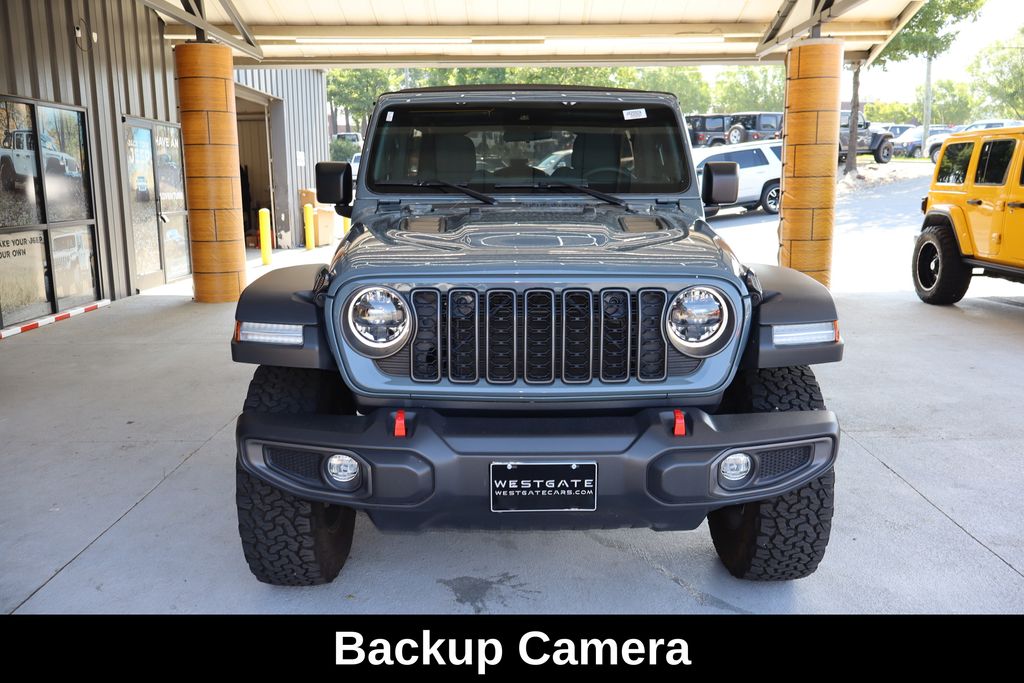 Used 2024 Jeep Wrangler 4-Door Rubicon with VIN 1C4PJXFN2RW128869 for sale in Raleigh, NC