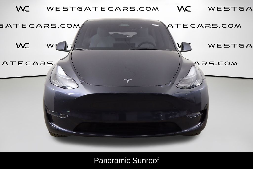 Used 2024 Tesla Model Y Long Range with VIN 7SAYGDED6RF055359 for sale in Raleigh, NC