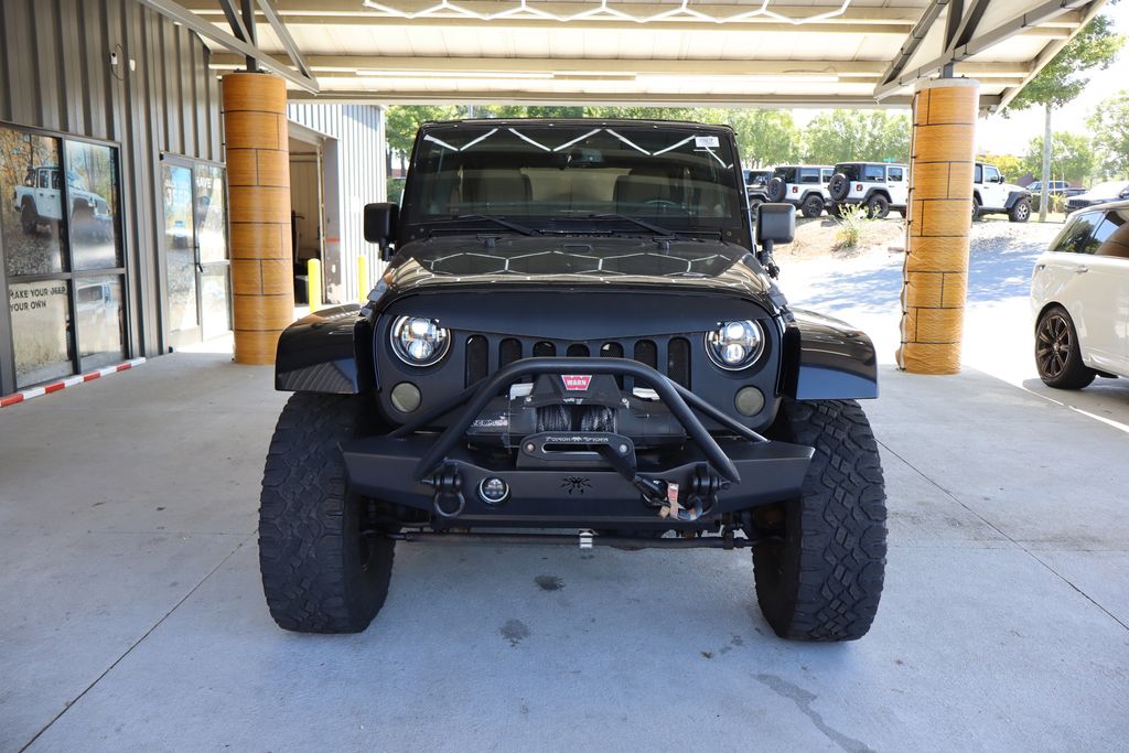 Used 2014 Jeep Wrangler Unlimited Sahara with VIN 1C4HJWEG2EL157964 for sale in Raleigh, NC