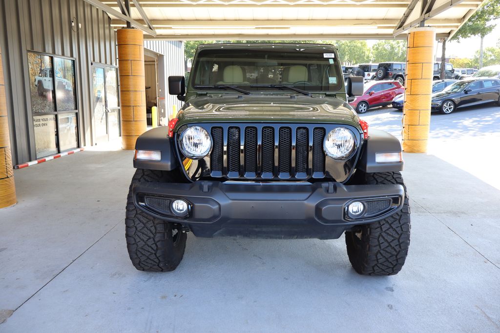 Used 2022 Jeep Wrangler Unlimited Willys Sport with VIN 1C4HJXDG1NW195563 for sale in Raleigh, NC