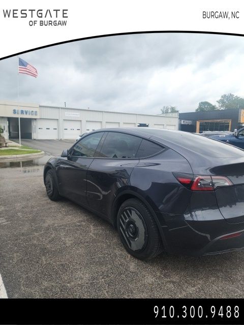 Used 2024 Tesla Model Y Long Range with VIN 7SAYGAEE6RF100145 for sale in Burgaw, NC