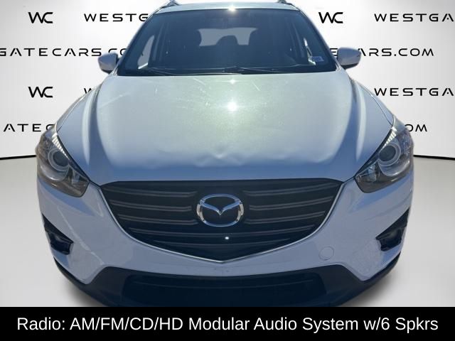 Used 2016 Mazda CX-5 Touring with VIN JM3KE2CY8G0624749 for sale in Wake Forest, NC