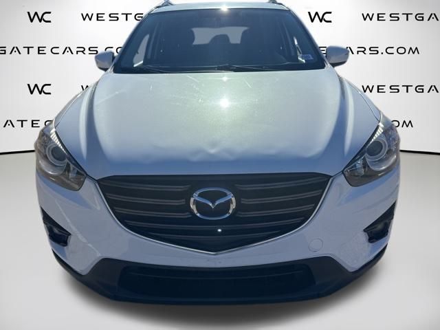 Used 2016 Mazda CX-5 Touring with VIN JM3KE2CY8G0624749 for sale in Wake Forest, NC