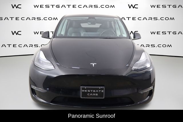 Used 2023 Tesla Model Y Long Range with VIN 7SAYGAEE8PF633563 for sale in Wake Forest, NC