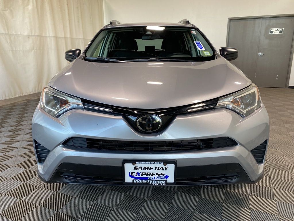 Used 2018 Toyota RAV4 LE with VIN JTMBFREV9JJ202850 for sale in Liverpool, NY