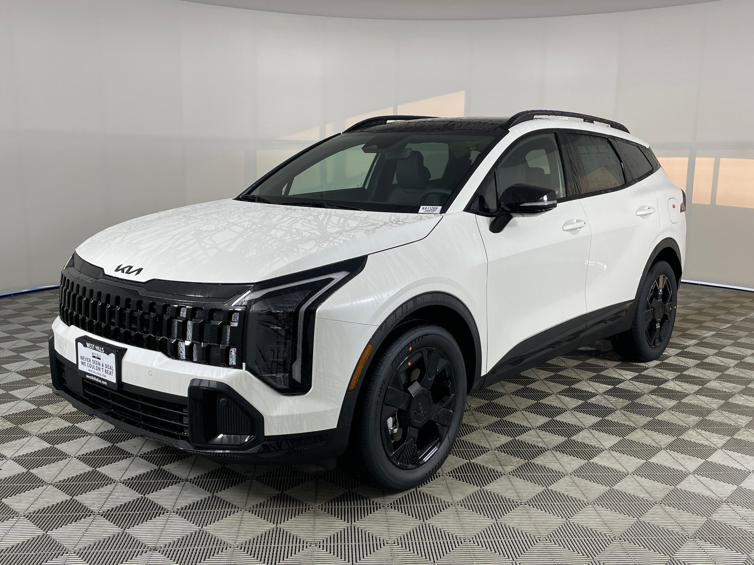 2026 Kia Sportage X-Line Hybrid's photo