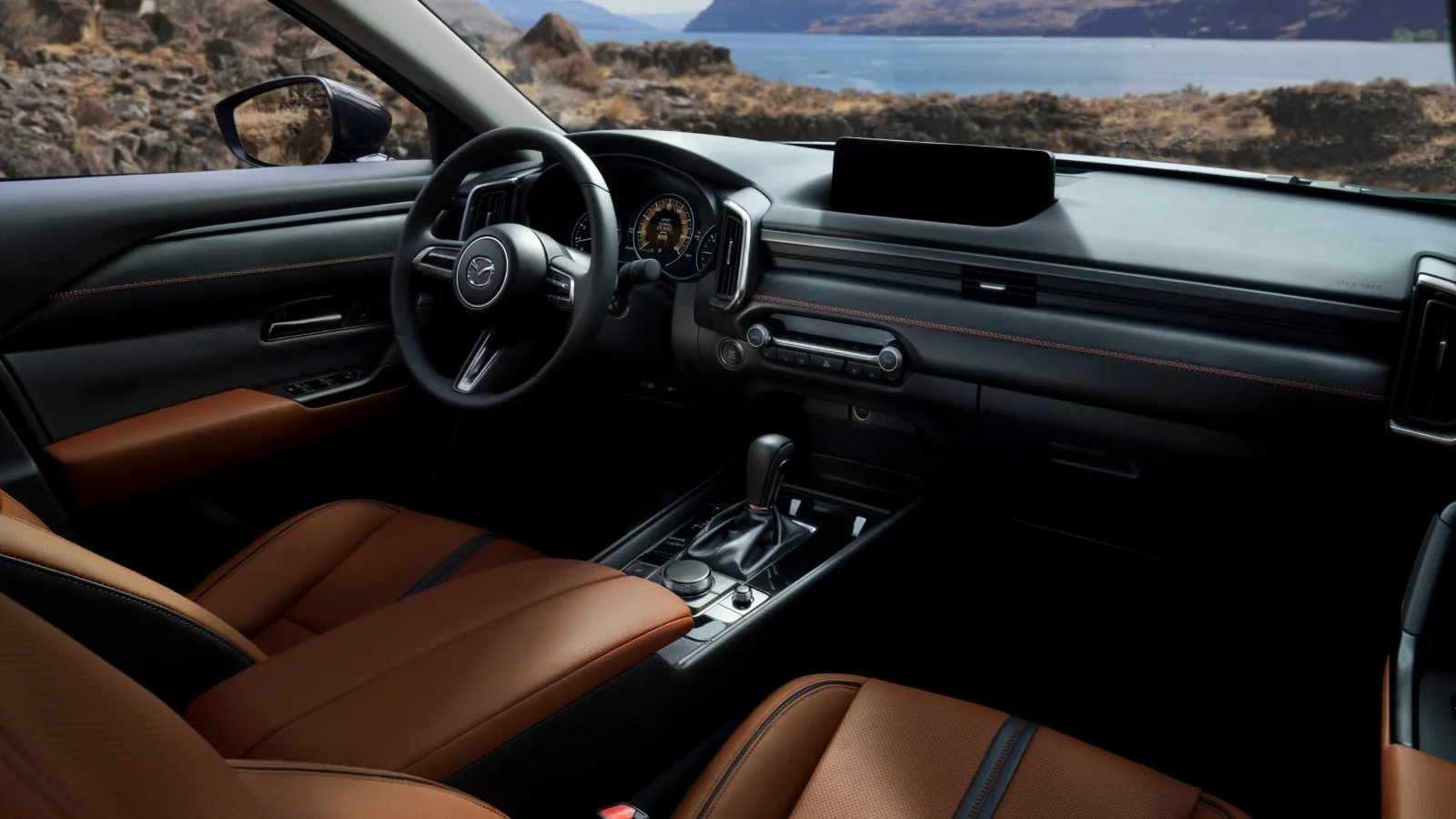 2026 Mazda CX-50 interior with large touchscreen.