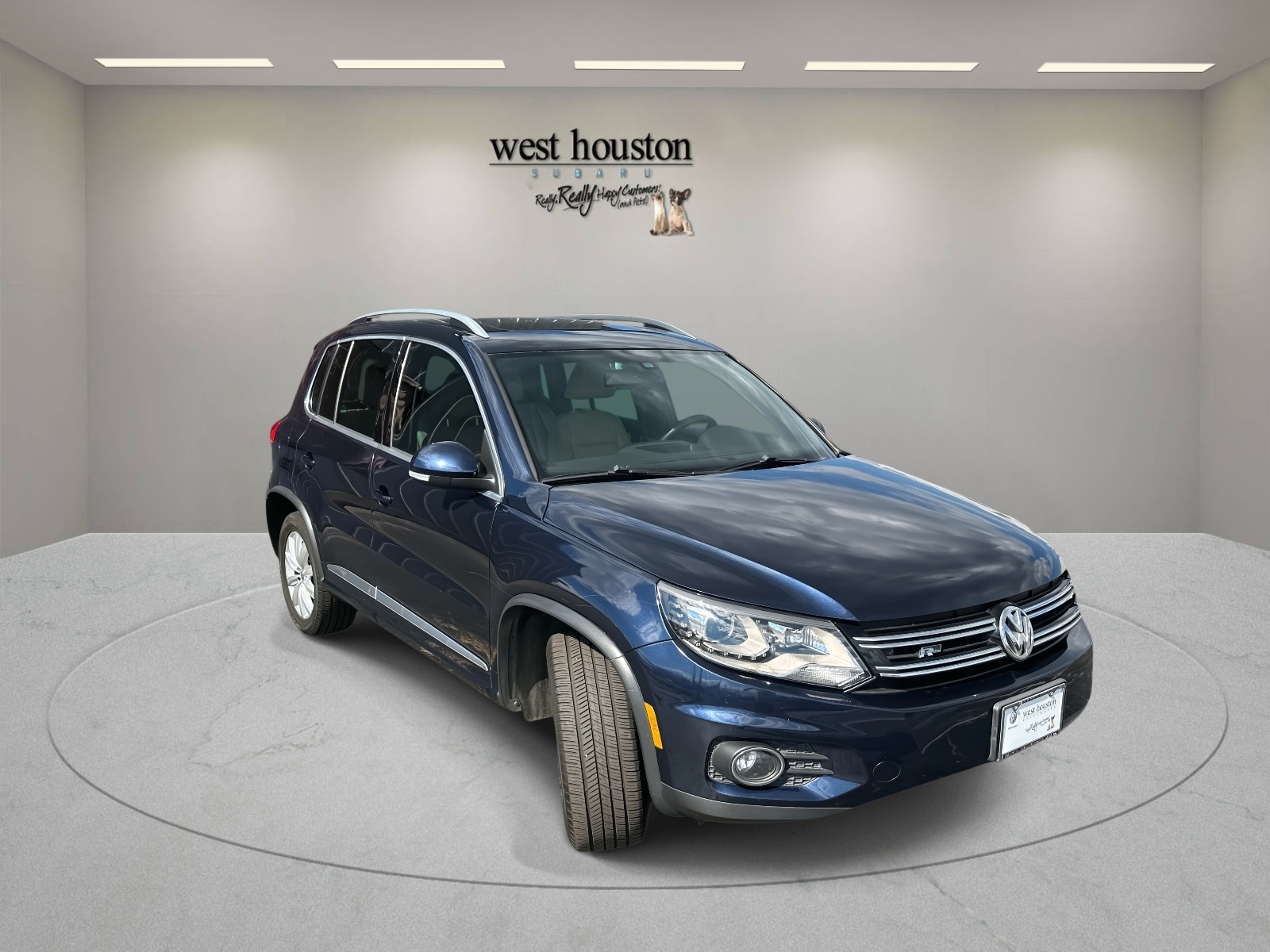 Used 2014 Volkswagen Tiguan SEL with VIN WVGAV3AX0EW062968 for sale in Houston, TX