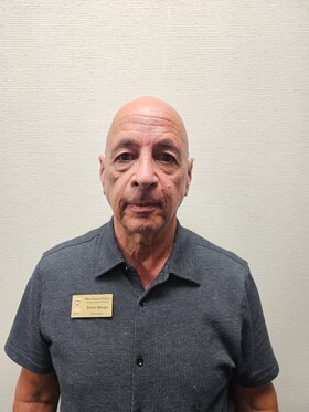 Staff member Simon Seruya from ID_f2e494