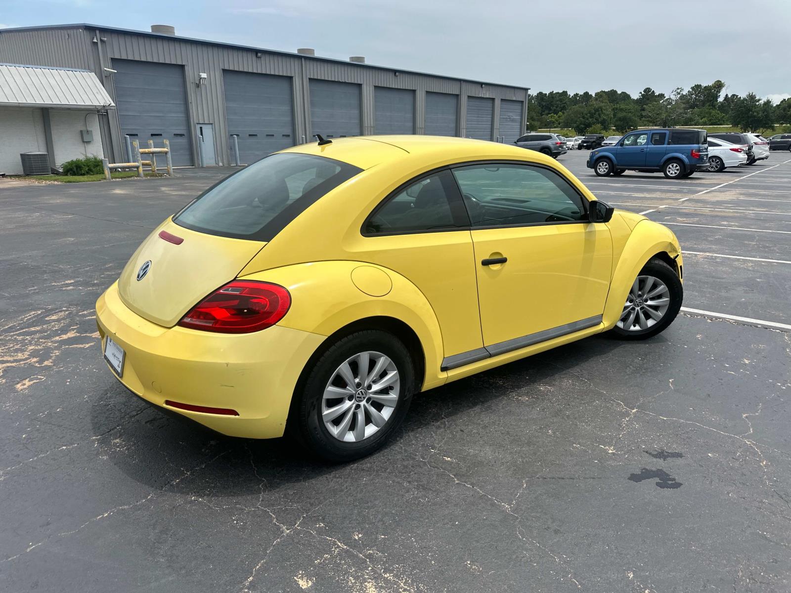Used 2015 Volkswagen Beetle 1.8 with VIN 3VWF17AT8FM619229 for sale in Houston, TX