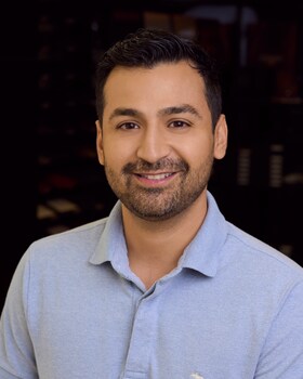 Staff member Adrian Gonzales from ID_2760f2b736a1
