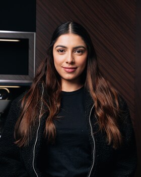 Staff member Andrea Carrion from ID_ac1c771d02f8