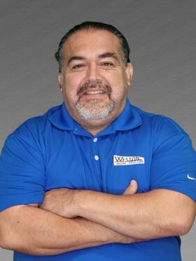 Staff member Hernan Hernandez from 54a69365ed70