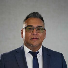 Staff member F Manny Rodriguez from ID_3e53b8