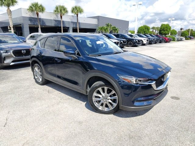 Used 2021 Mazda CX-5 Grand Touring with VIN JM3KFADM1M0392364 for sale in Royal Palm Beach, FL