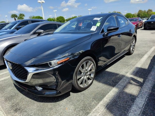 Used 2021 Mazda Mazda3 Premium with VIN JM1BPADL4M1331386 for sale in Royal Palm Beach, FL