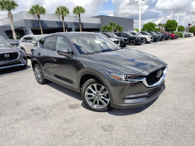 Used 2021 Mazda CX-5 Signature with VIN JM3KFBEY0M0455283 for sale in Royal Palm Beach, FL