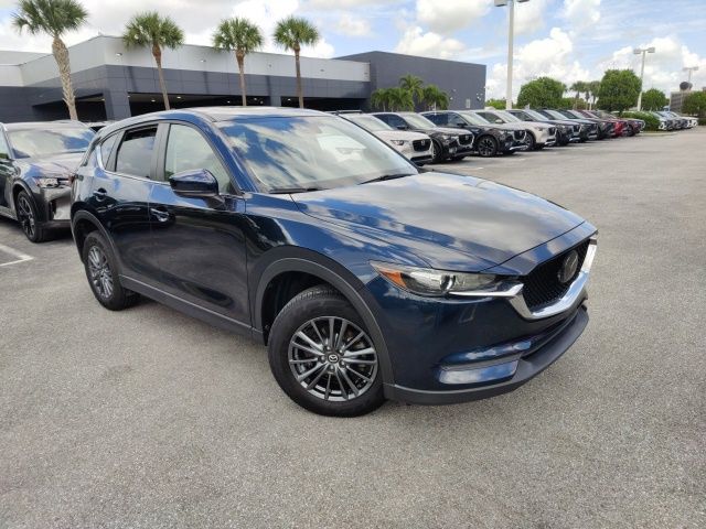 Used 2021 Mazda CX-5 Touring with VIN JM3KFBCMXM0455369 for sale in Royal Palm Beach, FL