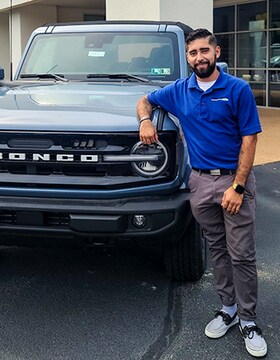 Staff member Cesar "Chris" Flores from ID_49fc9c009aa1