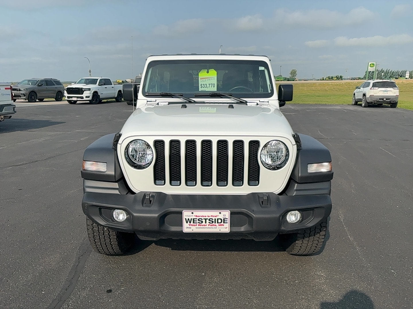 Used 2023 Jeep Wrangler 4-Door Altitude with VIN 1C4HJXDG0PW577974 for sale in Thief River Falls, Minnesota