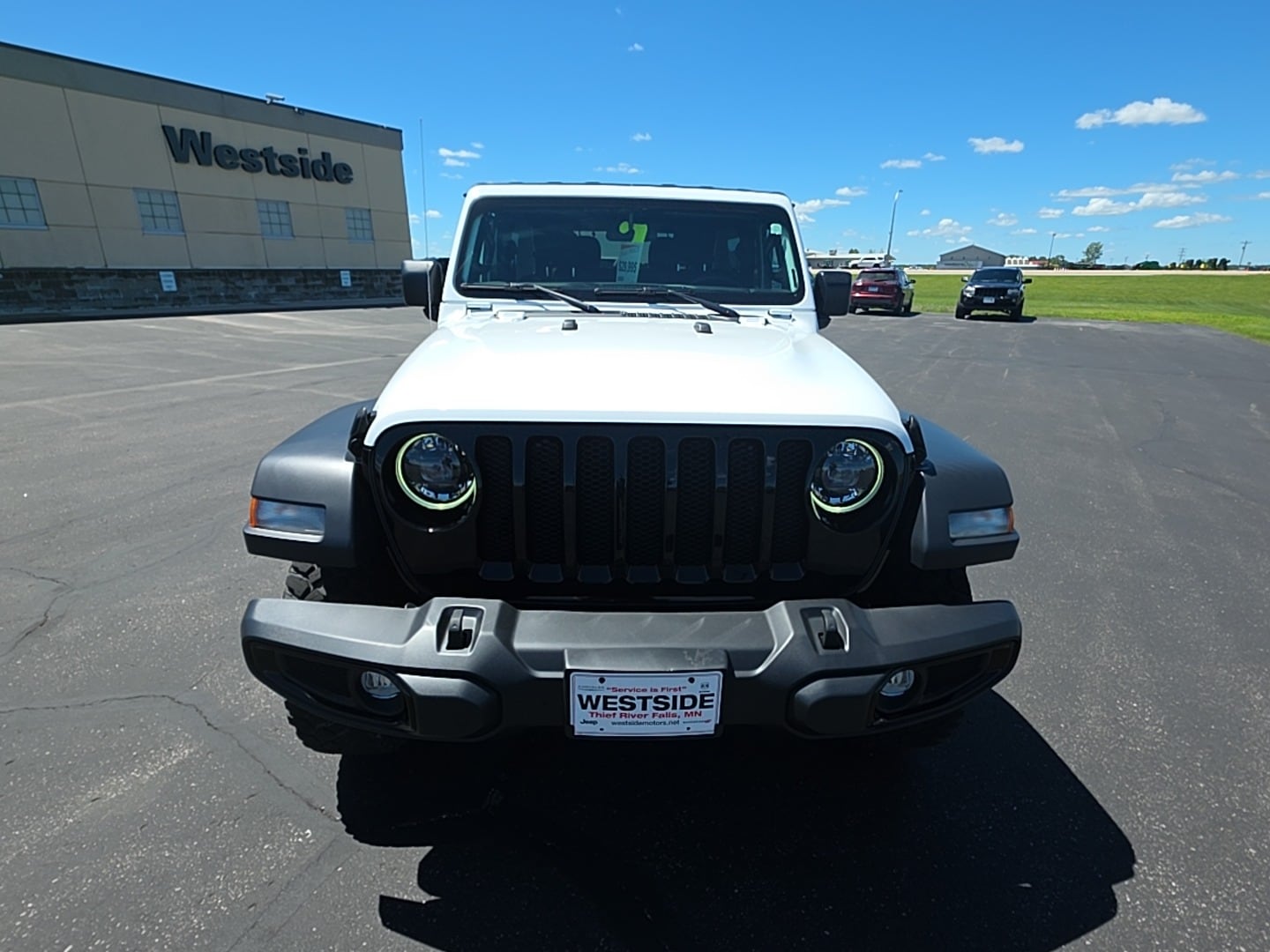 Used 2023 Jeep Wrangler 2-Door Willys with VIN 1C4HJXAG8PW658046 for sale in Thief River Falls, Minnesota