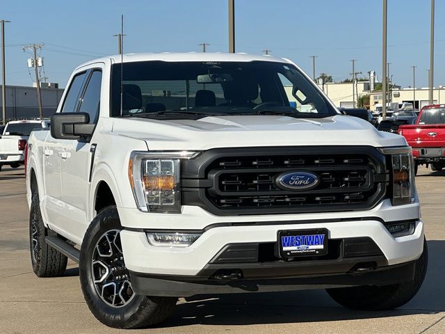 Used 2022 Ford F-150 XLT with VIN 1FTFW1E85NKE94106 for sale in Irving, TX