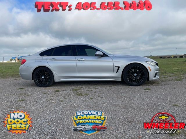 Used 2015 BMW 4 Series 428i with VIN WBA4A5C59FG052310 for sale in New Cordell, OK