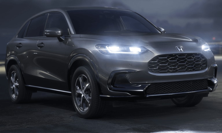 2025 Honda HR-V parked at night with headlights