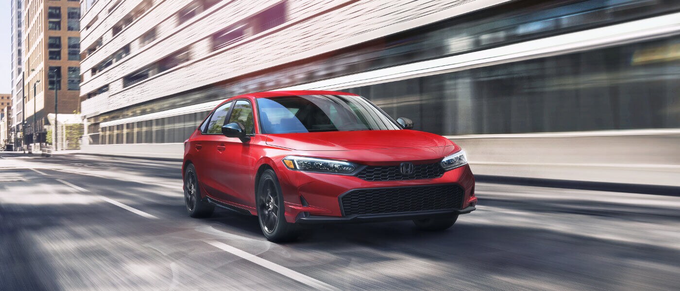 2026 Honda Civic Exterior Driving Through City Blur